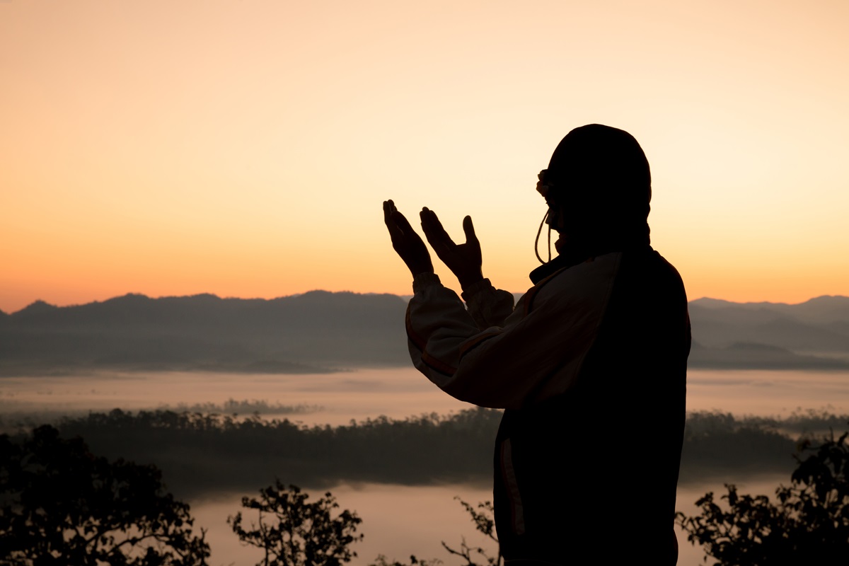 A serene individual meditating, representing the peaceful mood attained through a prayer for peace of mind.